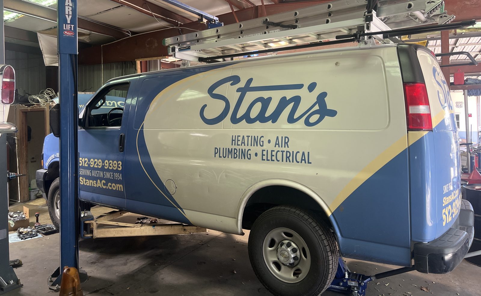 Commercial fleet van on the lift at Abee's